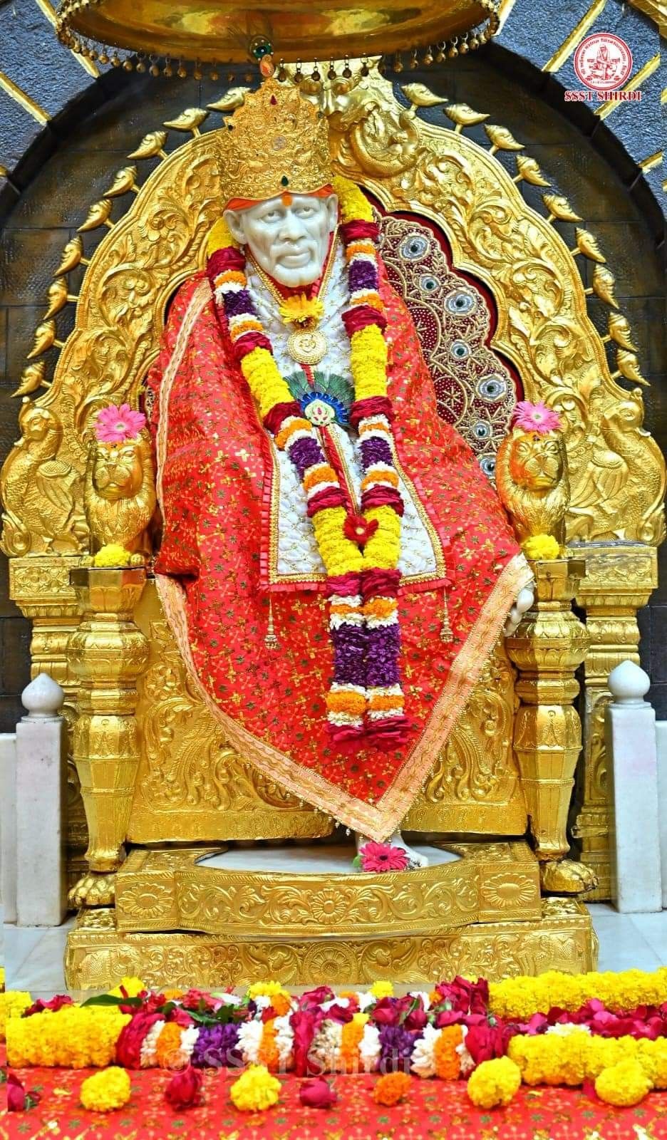 Sai Baba on golden throne