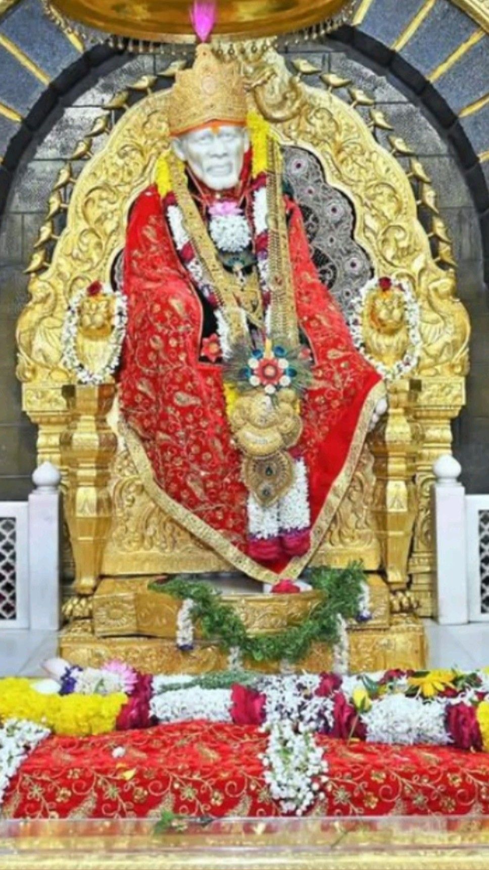 Sai Baba idol on golden throne