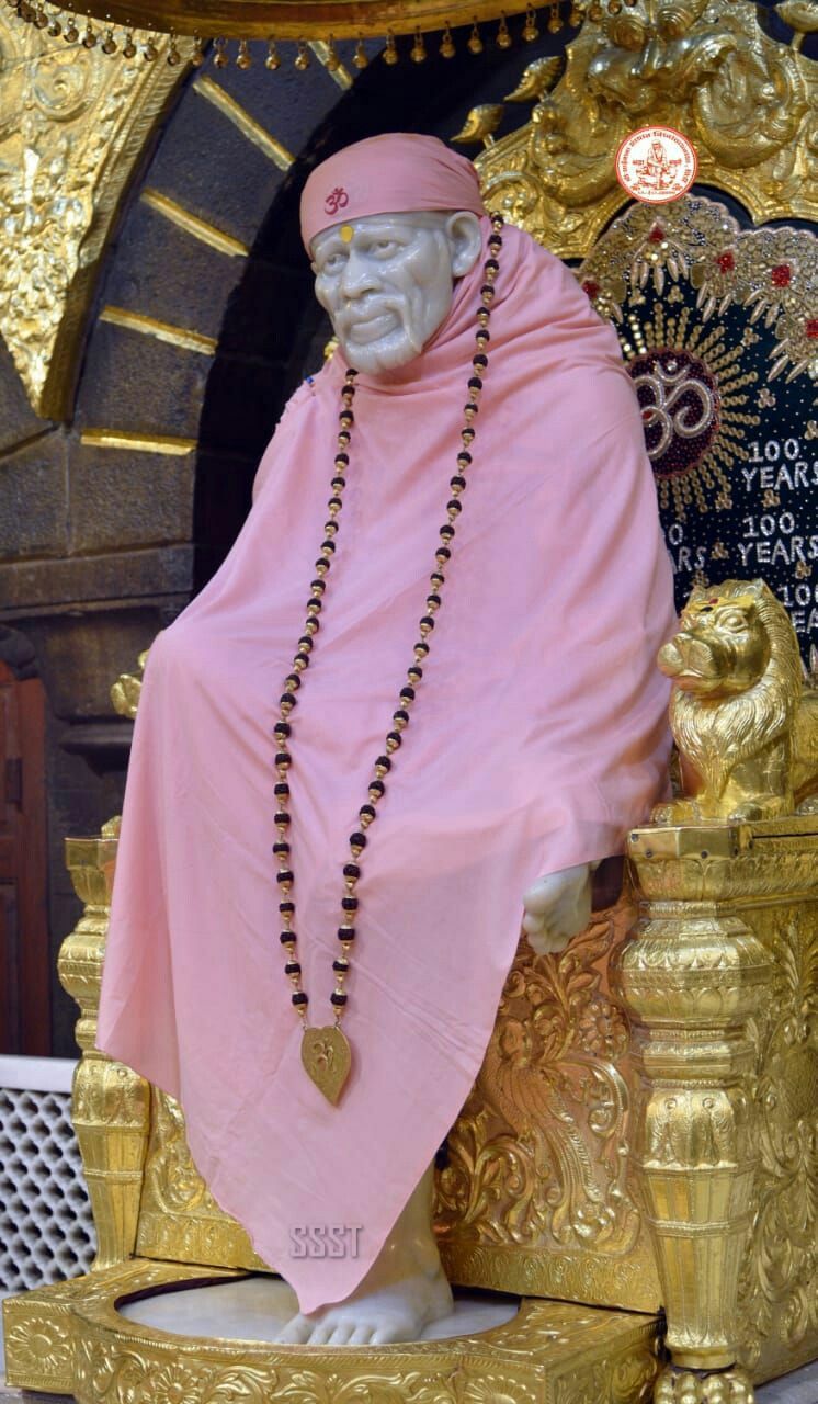 Sai Baba idol in pink robes