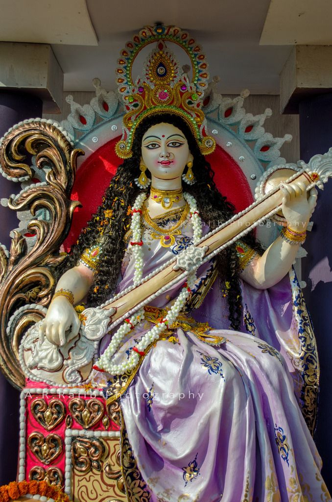 Saraswati Maa playing the veena.