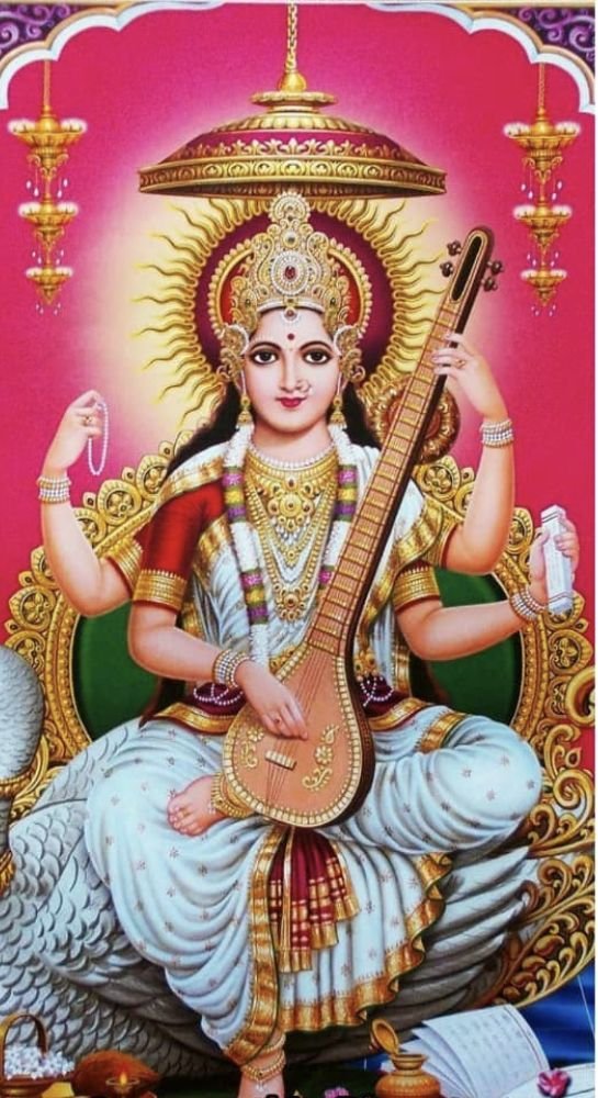 Goddess Saraswati playing the veena