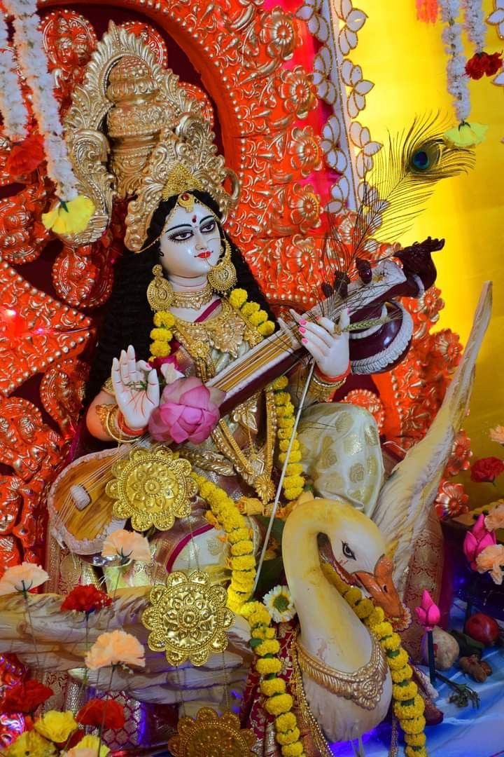 Saraswati Maa playing the veena.
