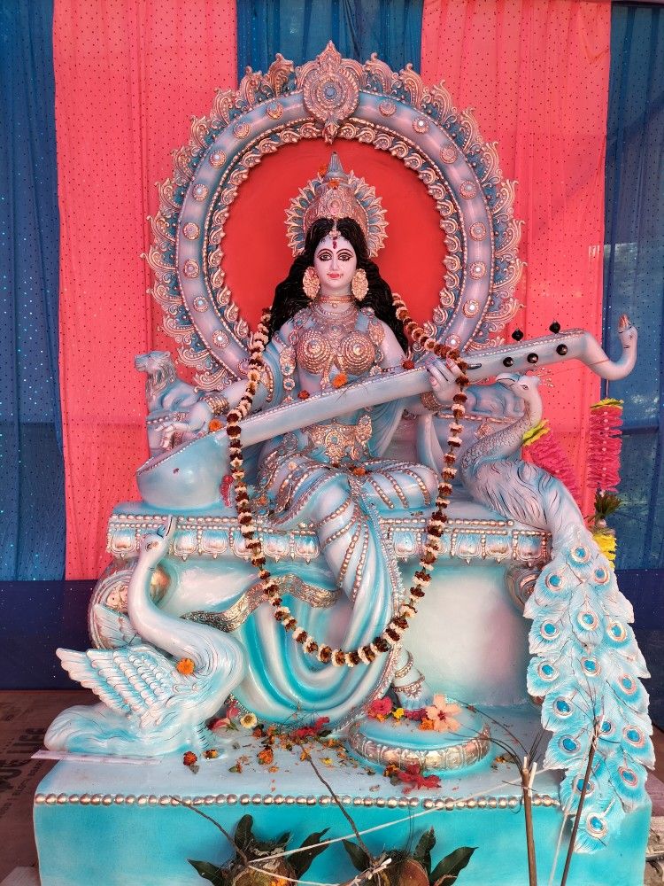 Goddess Saraswati with veena and swan