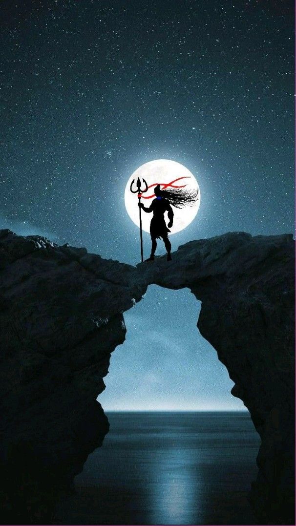 Shiva stands against a starry sky