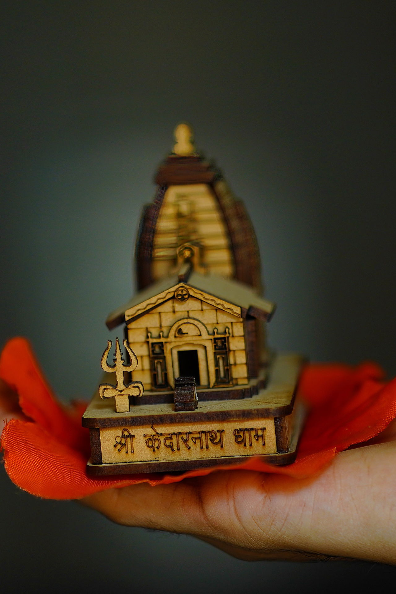 Kedarnath temple held in praying hands