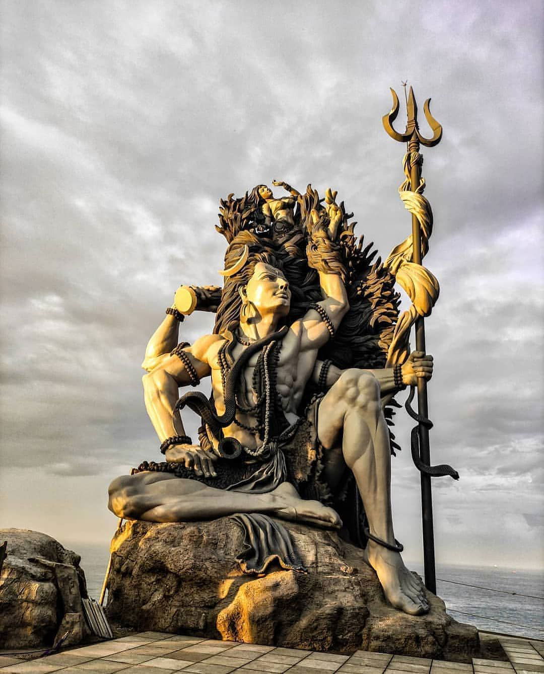 Lord Shiva meditating by the ocean