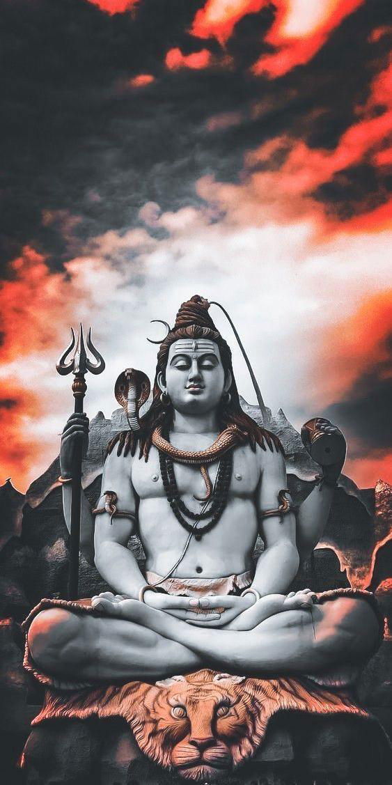 Meditating Shiva amongst fiery mountains