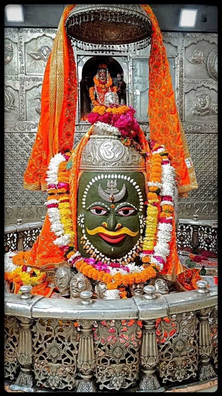 Lord Shiva face temple stone carving