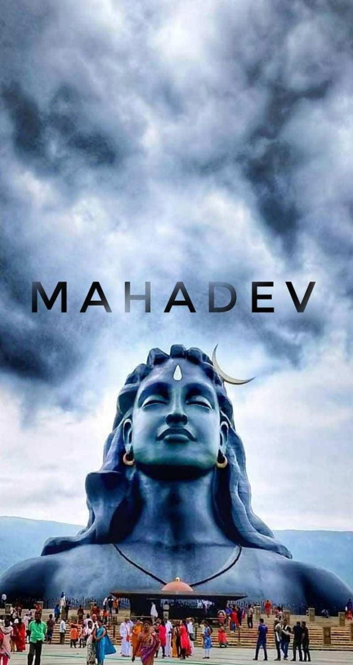 Majestic Shiva statue amidst mountain landscape