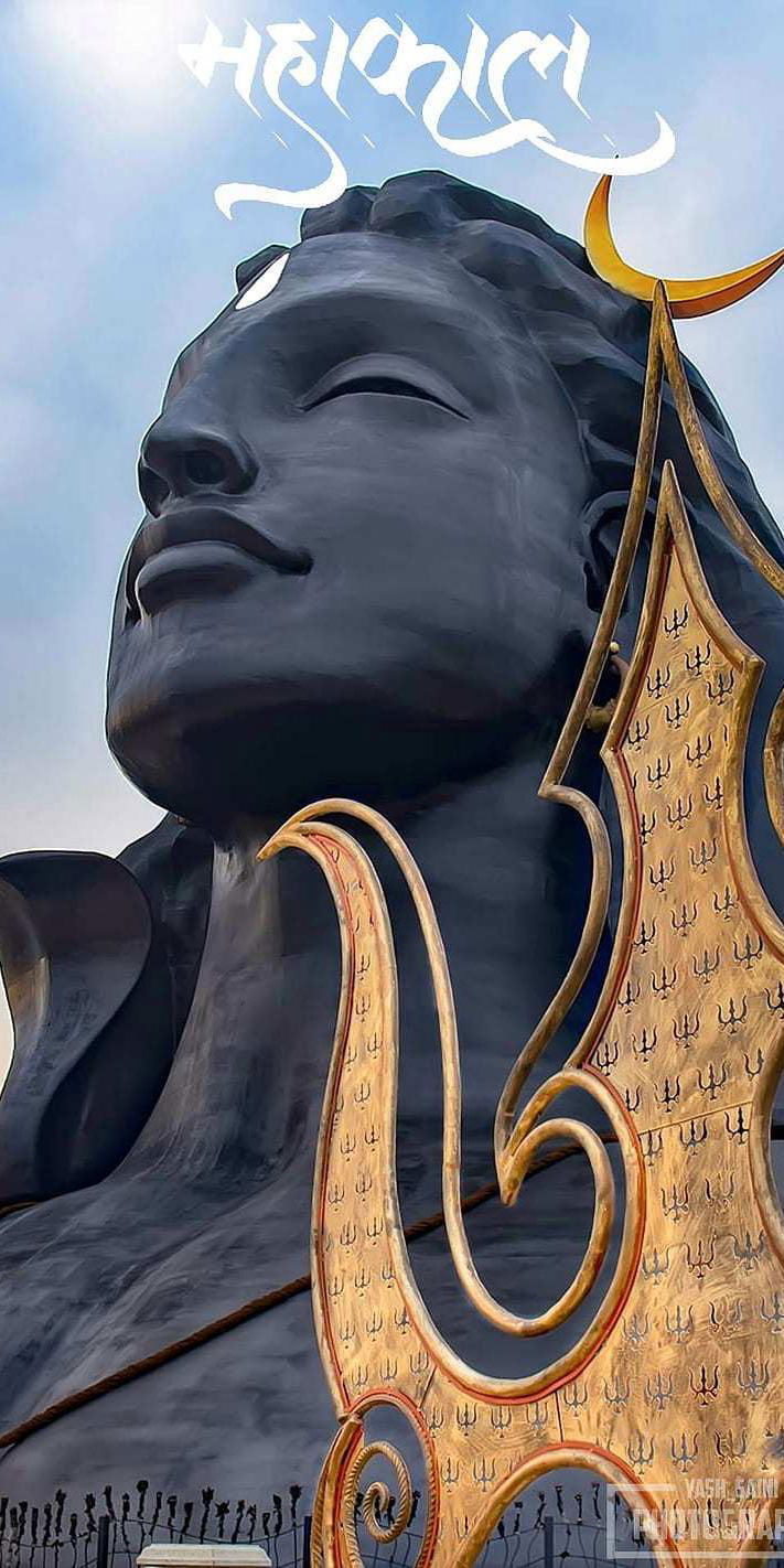 Shiva with Trishul, serene mountain backdrop