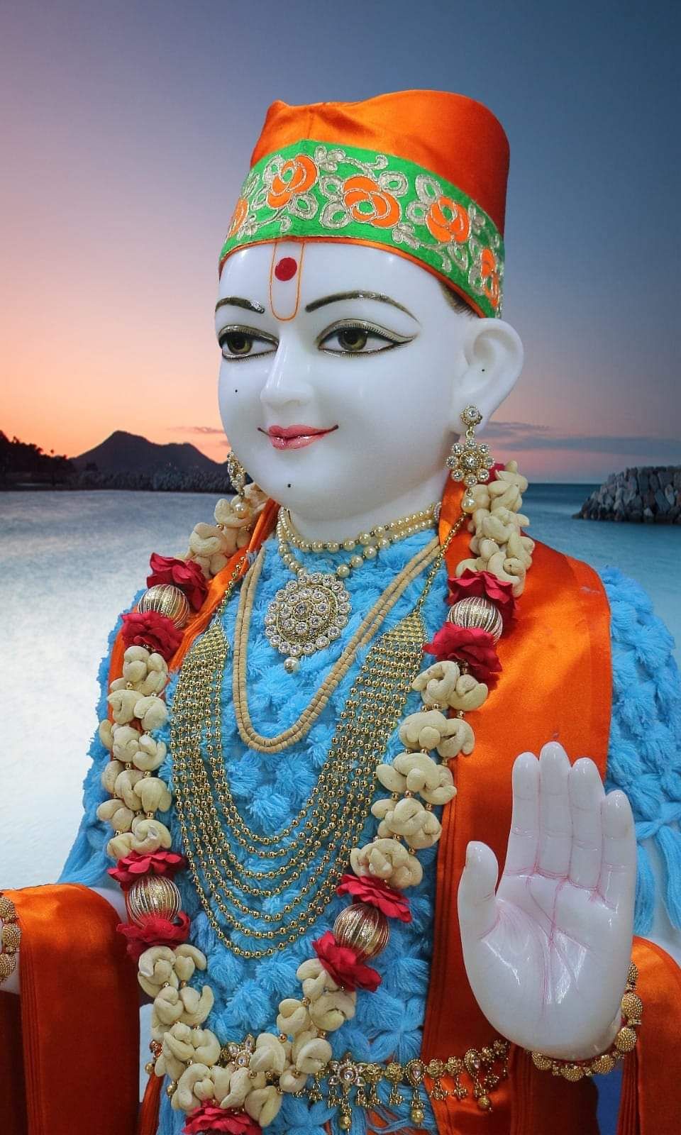Swaminarayan statue offering blessings