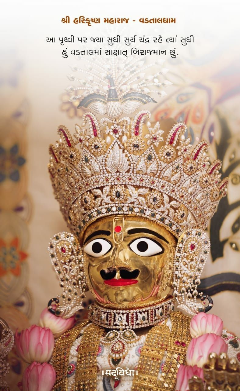 Swaminarayan deity with ornate headgear.