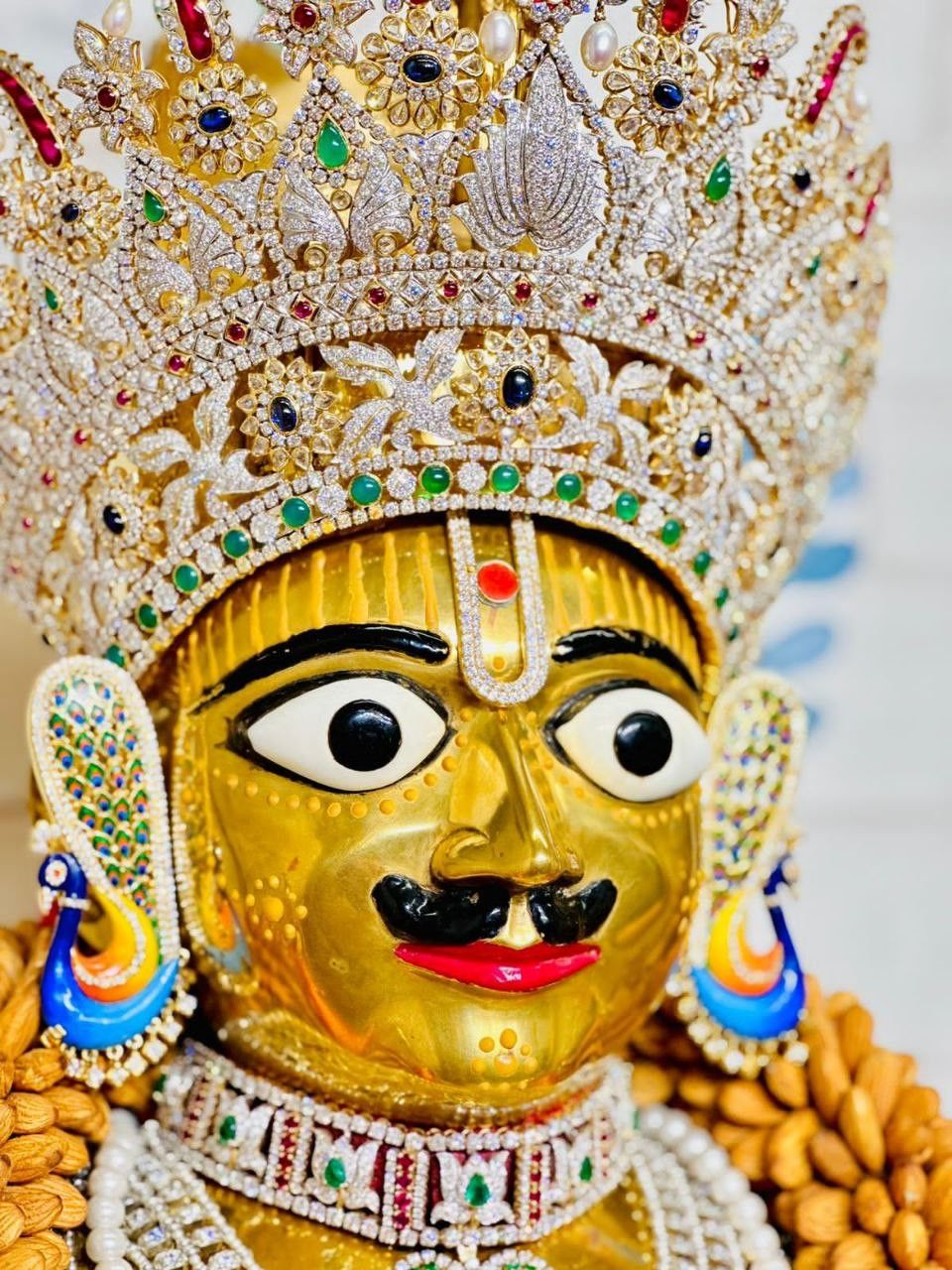 Golden face of Swaminarayan Bhagwan.
