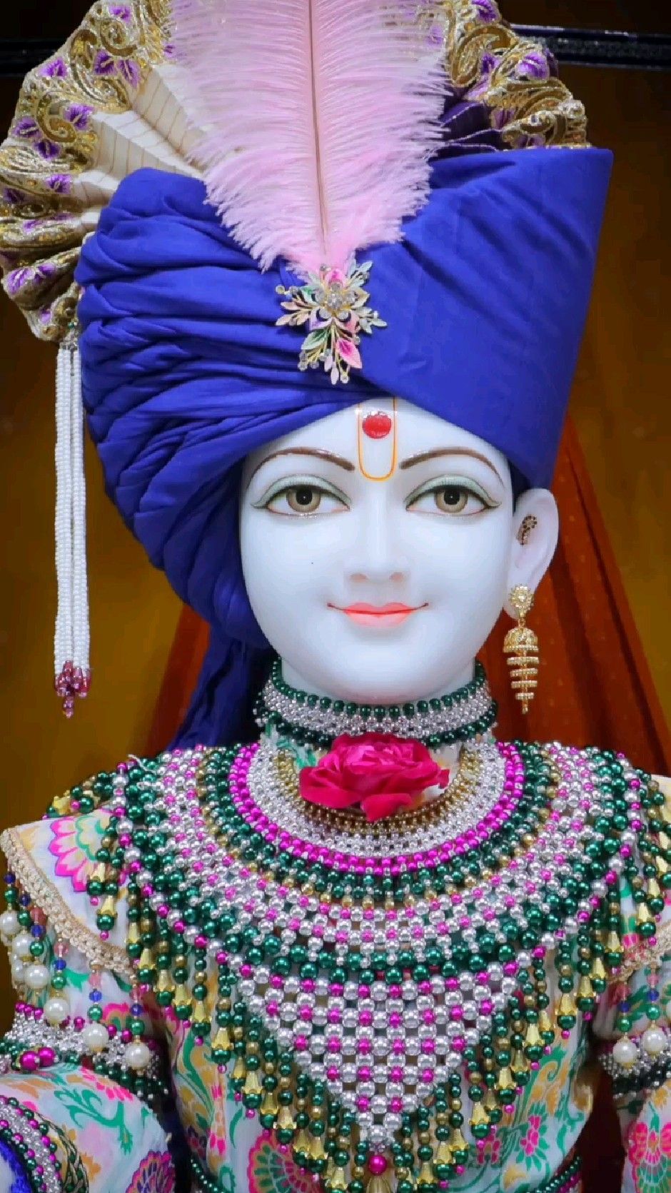 Swaminarayan with ornate jewelry and turban
