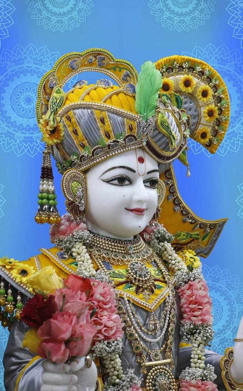 Beautiful Swaminarayan portrait with floral adornments