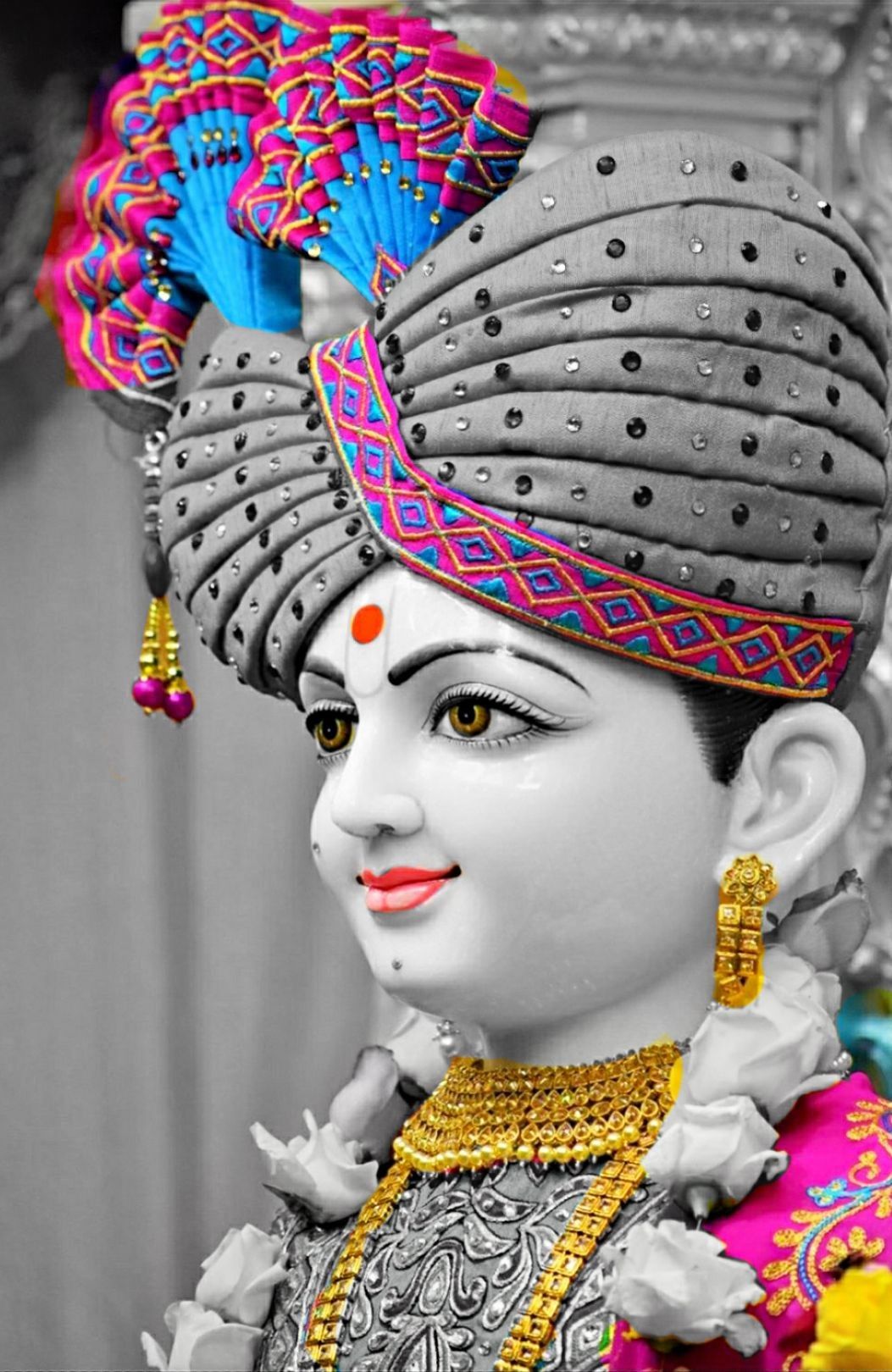 Swaminarayan with elaborate colorful turban