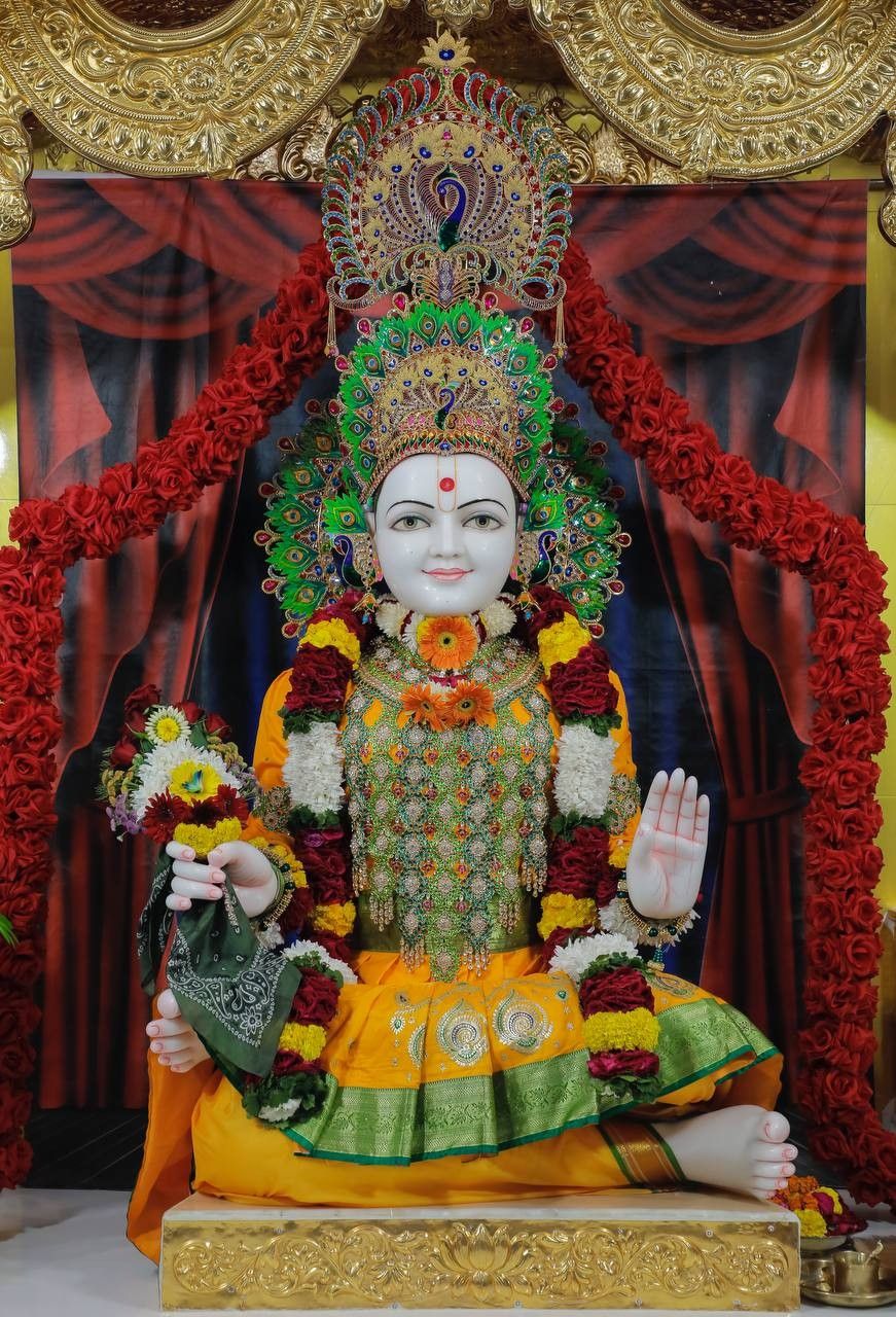 Swaminarayan Bhagwan seated in temple.