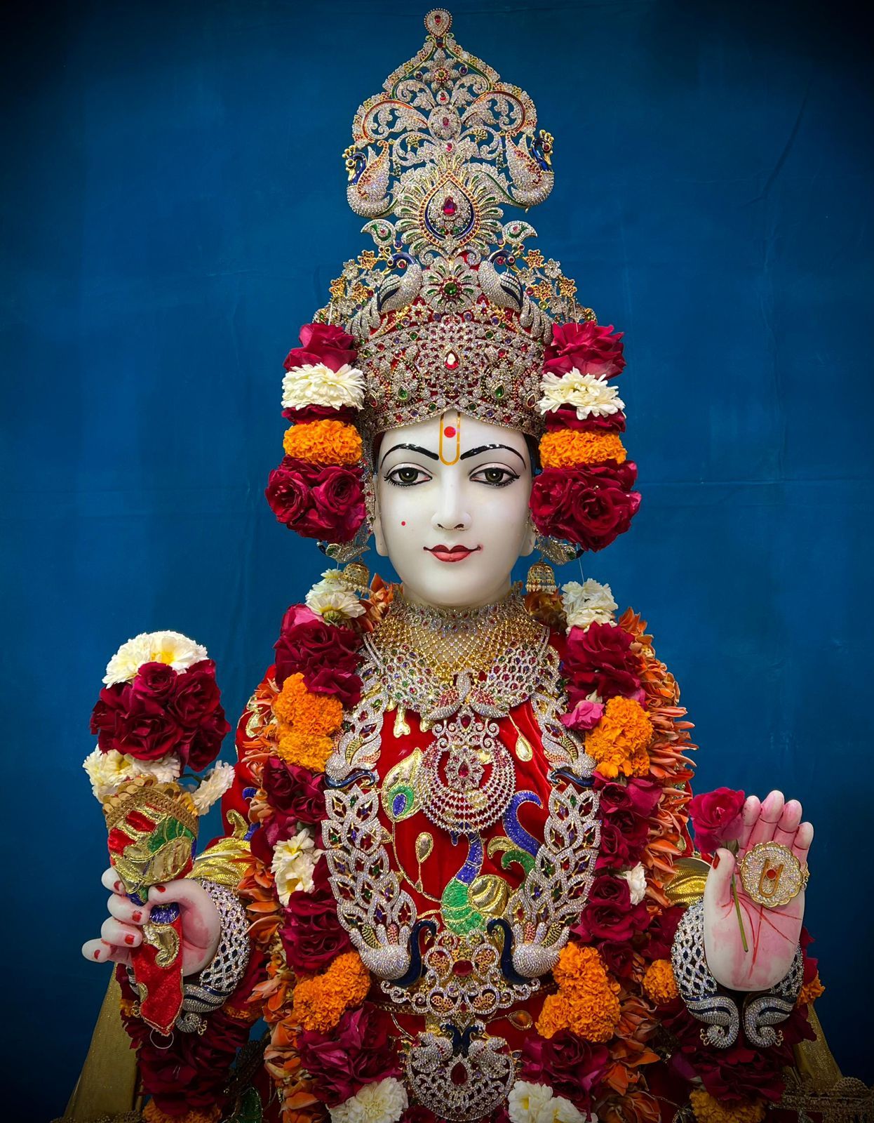 Swaminarayan Bhagwan with floral adornments