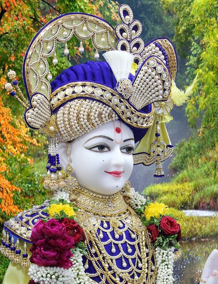 Swaminarayan with floral garland and mukut