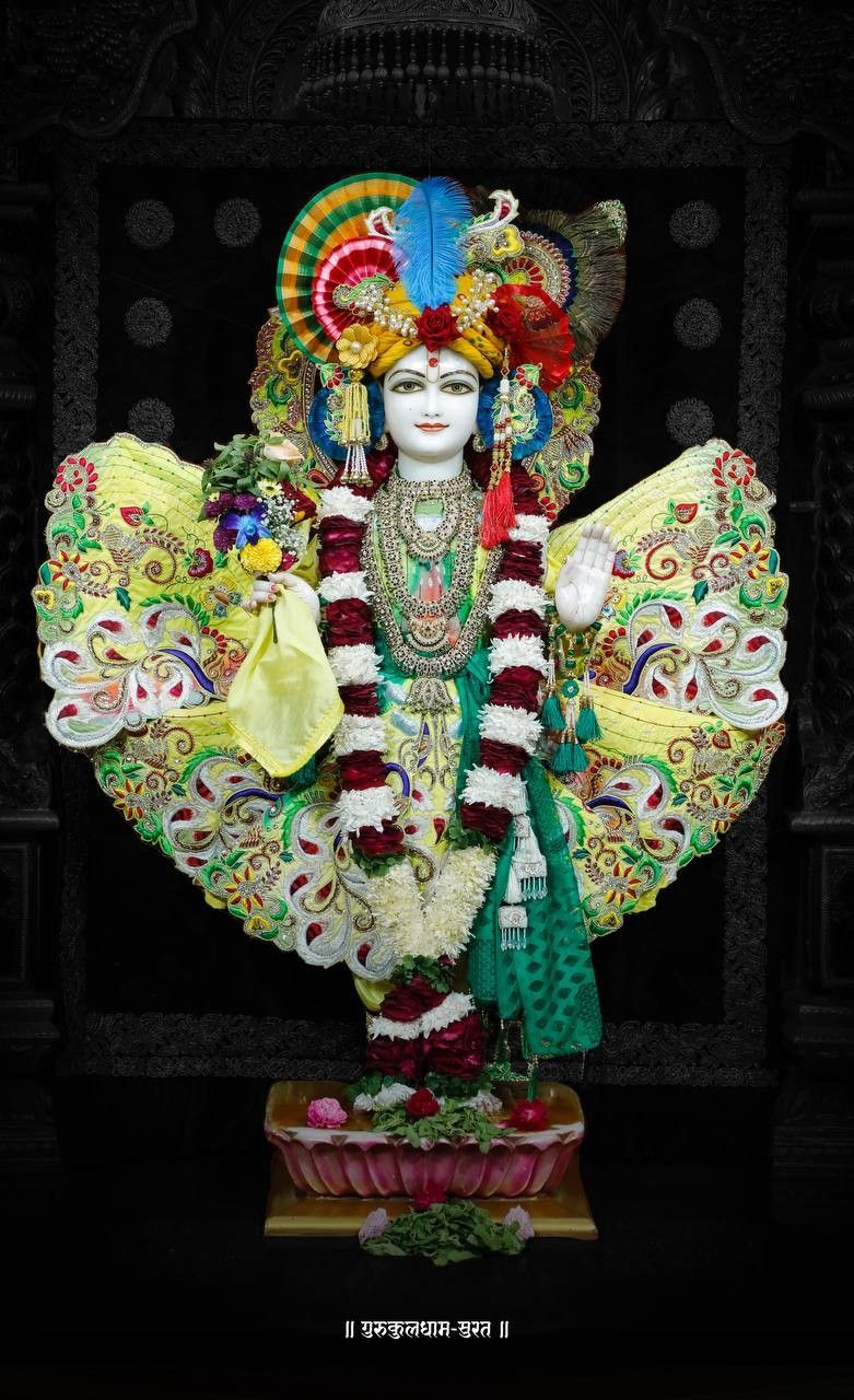 Swaminarayan deity in ornate temple setting