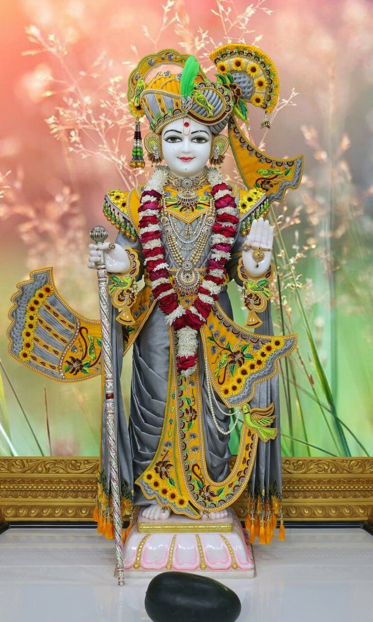 Swaminarayan Bhagwan with mace and garland
