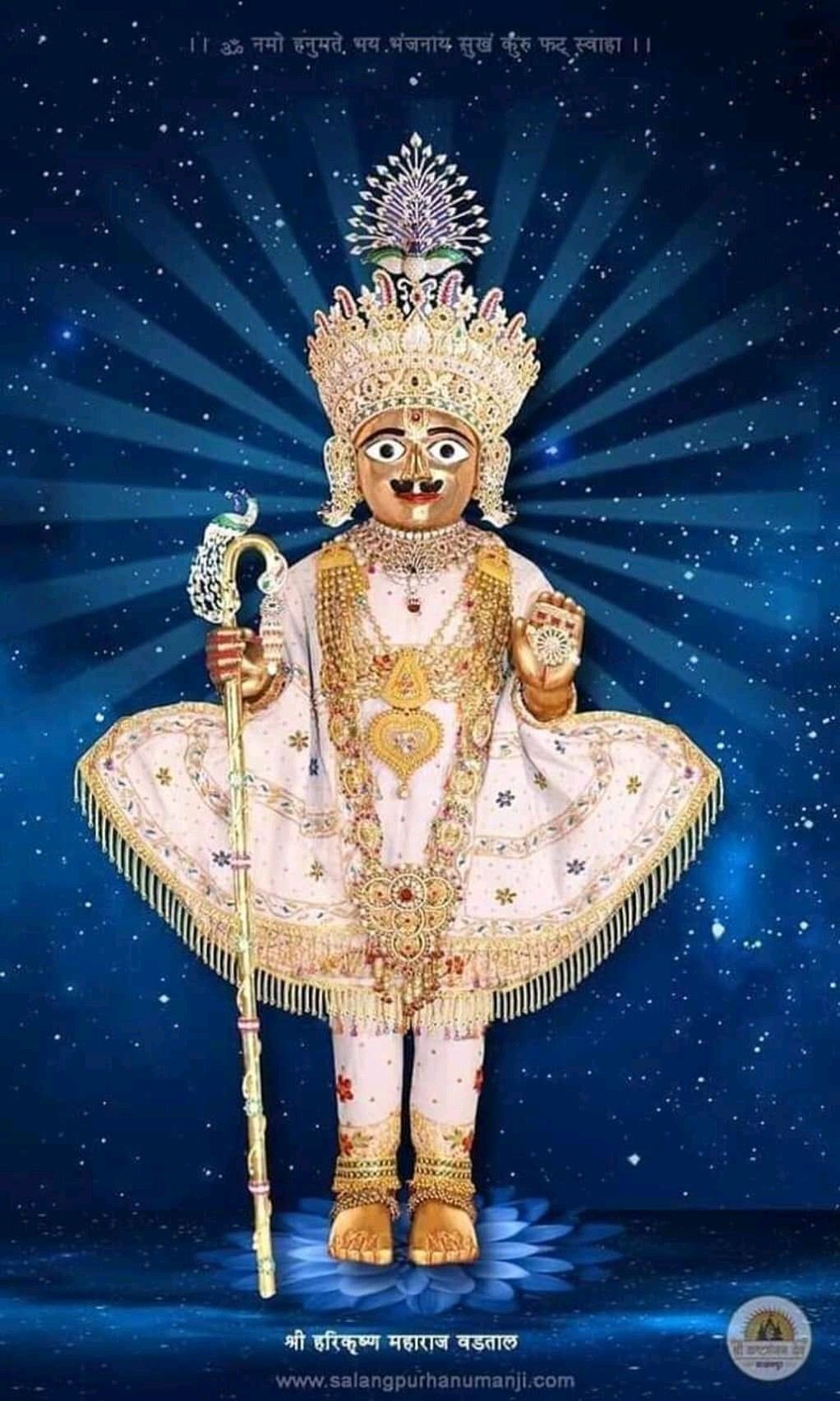 Swaminarayan deity with celestial background
