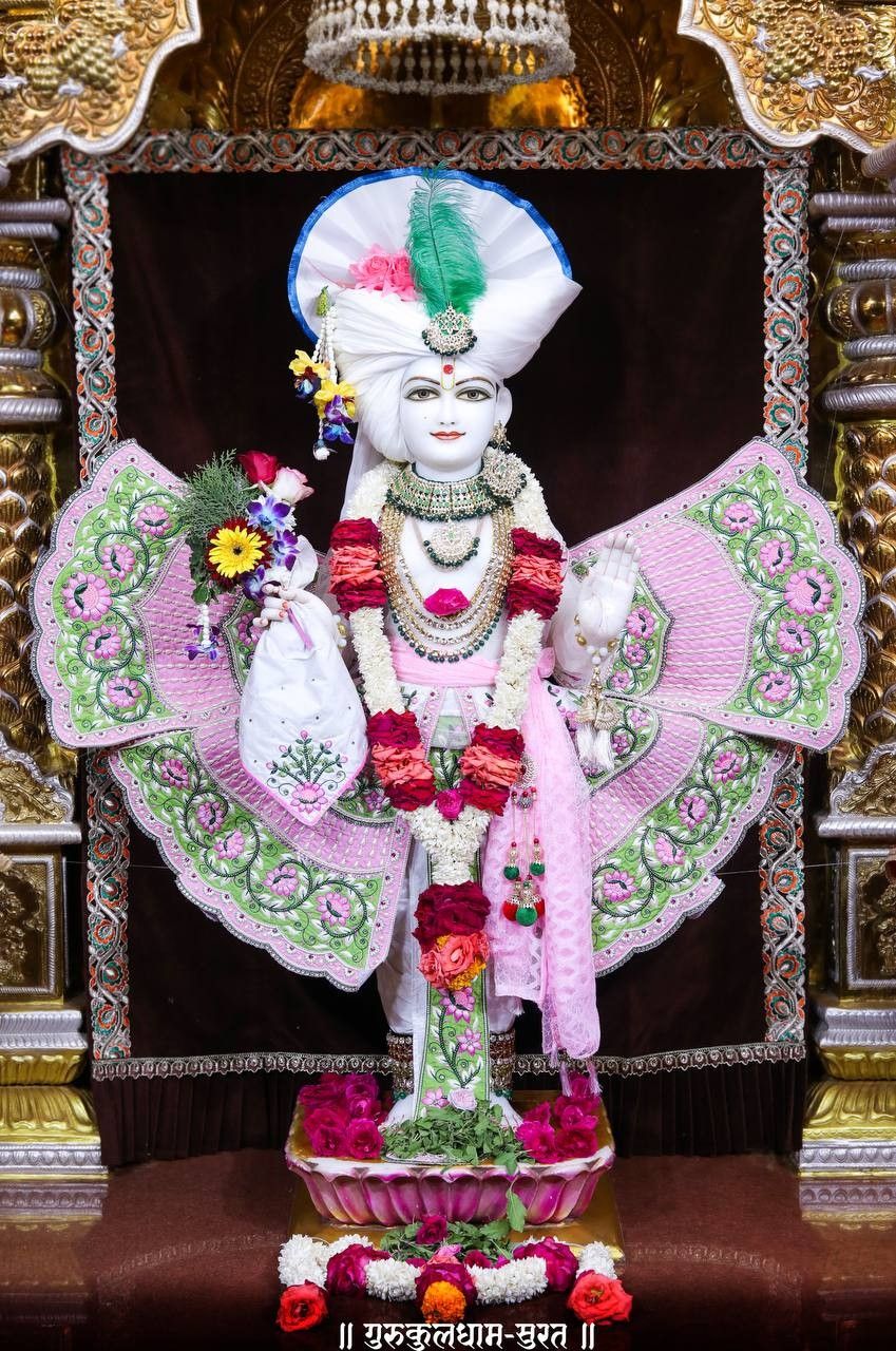 Swaminarayan Bhagwan adorned in floral splendor