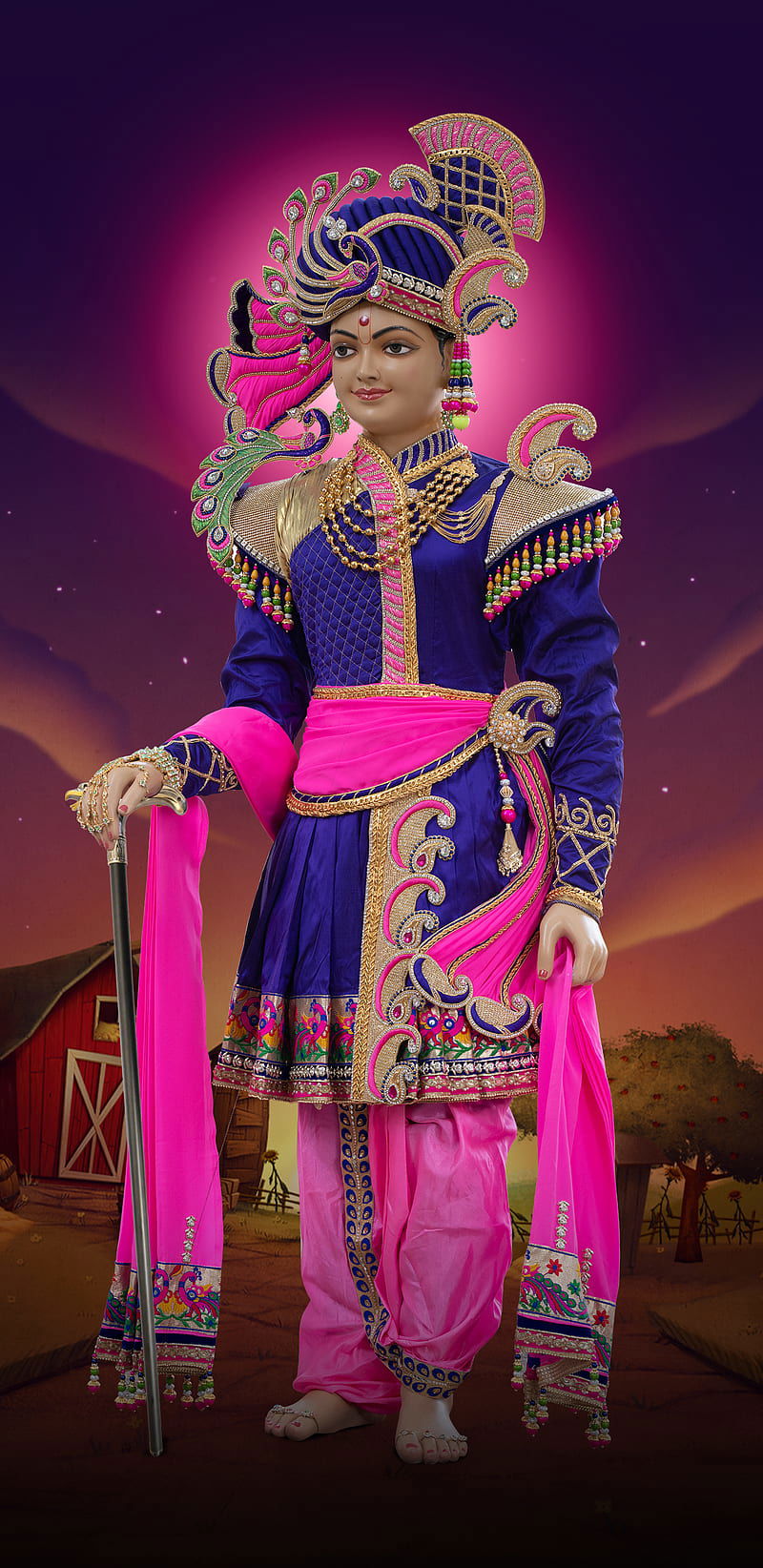 Swaminarayan in vibrant regal attire.