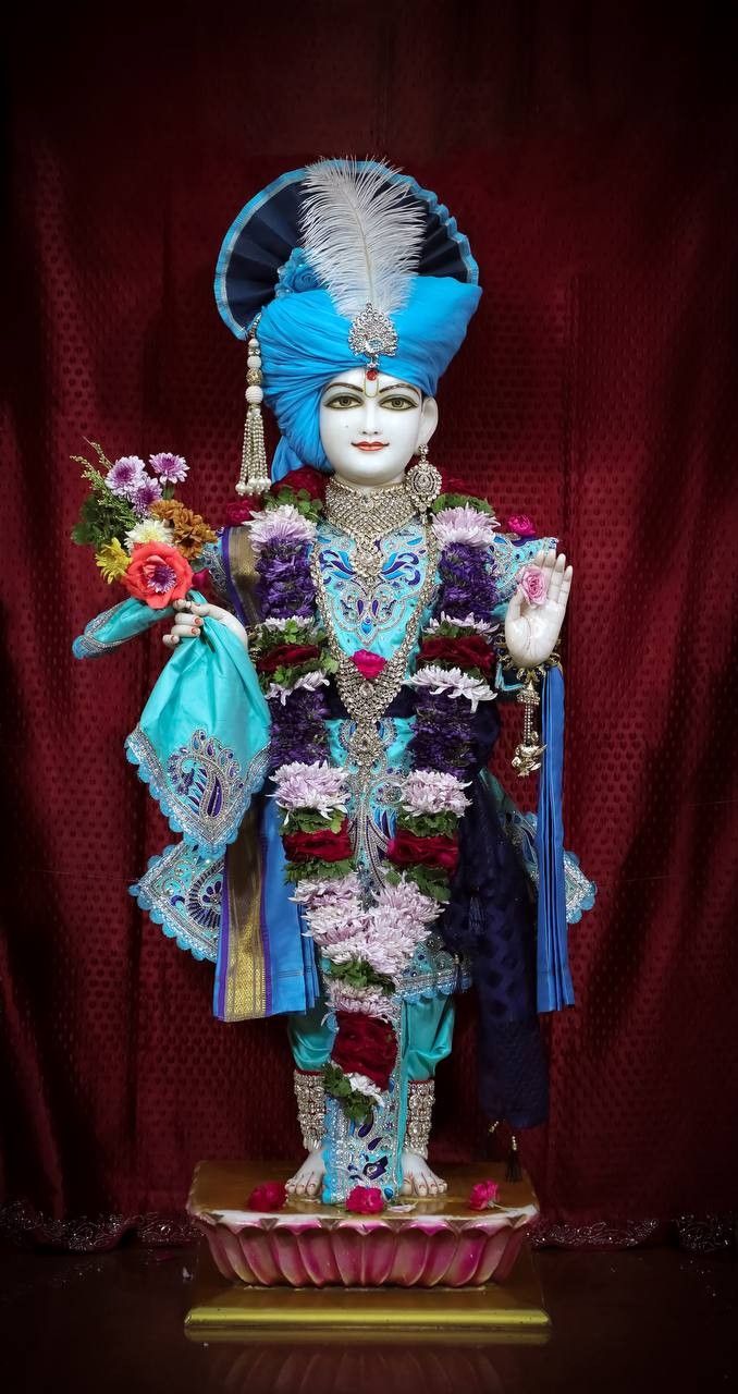 Swaminarayan deity adorned with flowers