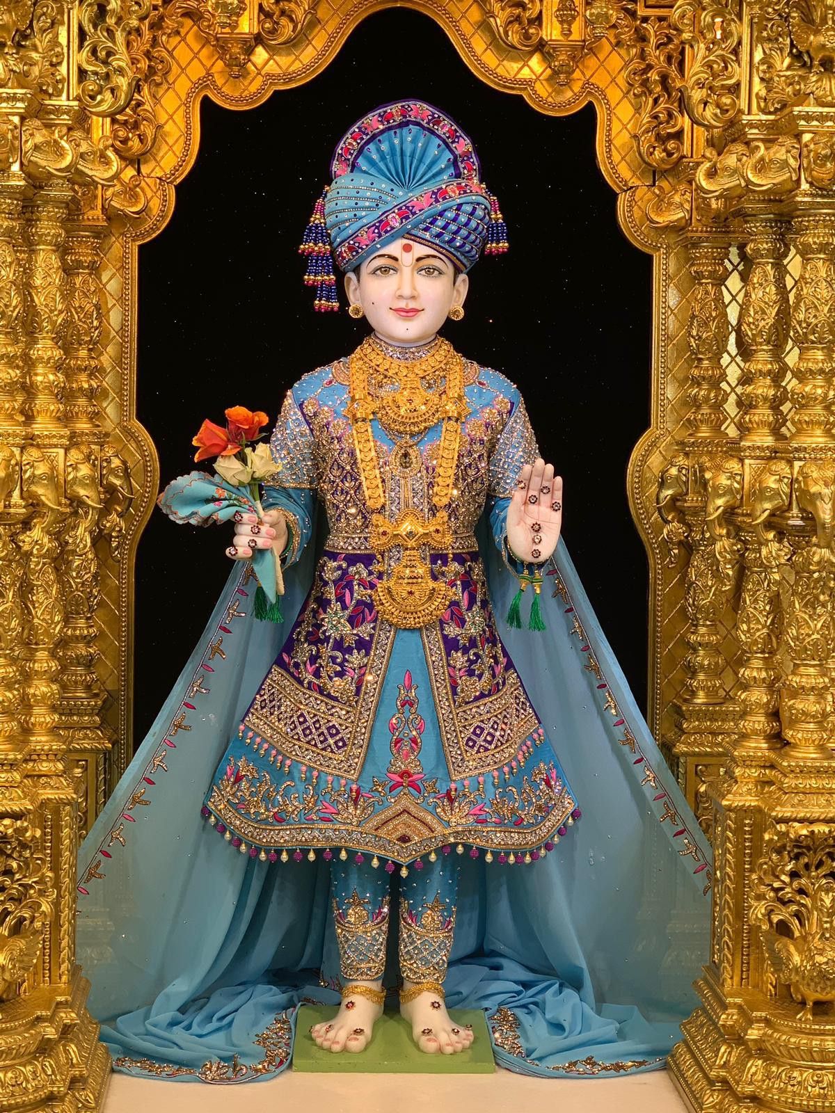Swaminarayan Bhagwan in golden frame
