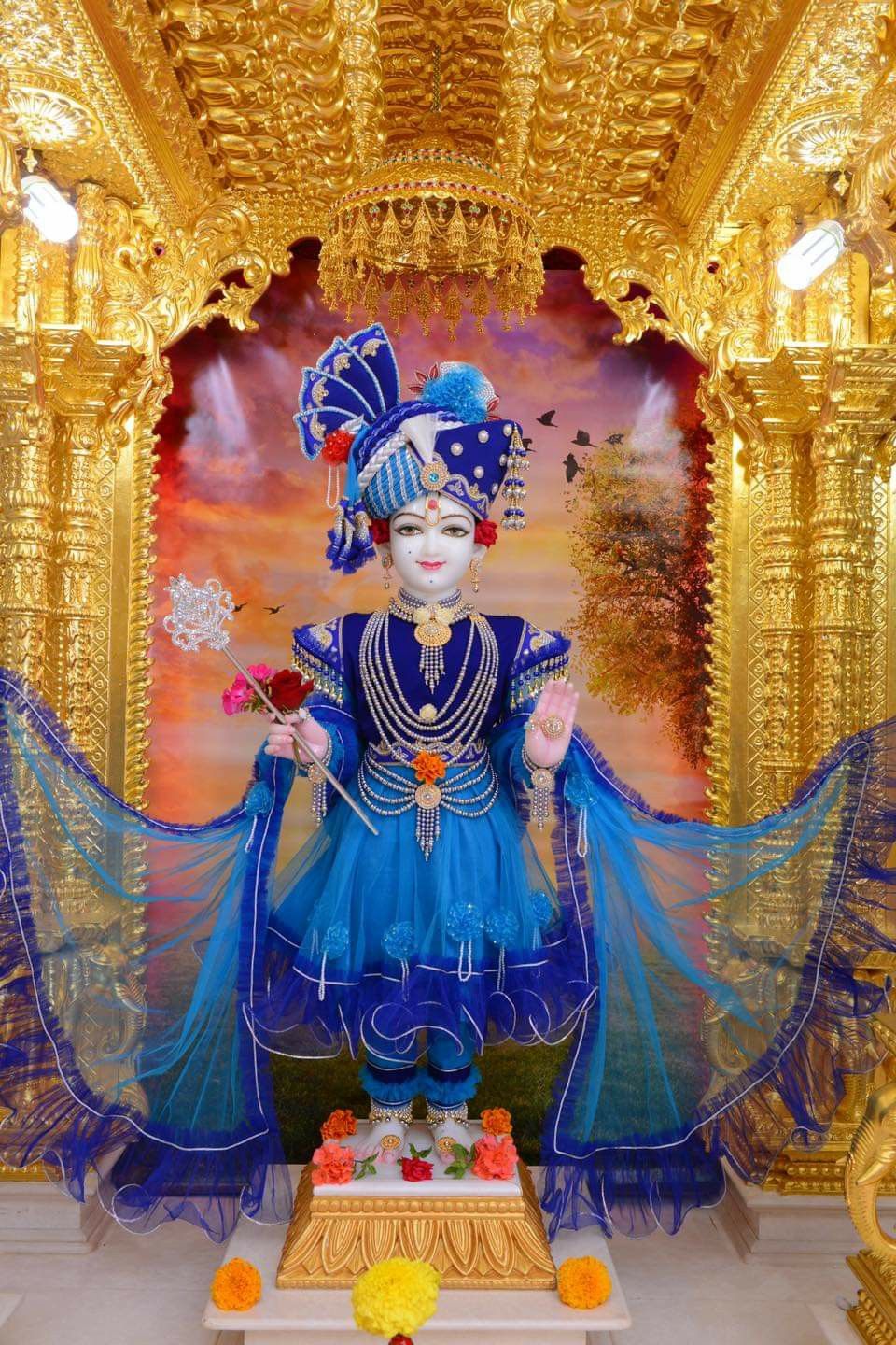 Swaminarayan in ornate temple setting