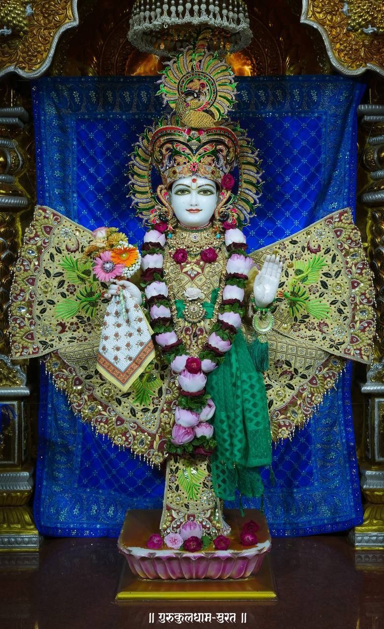 Swaminarayan adorned in floral garland