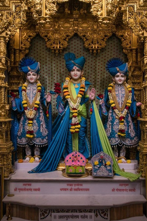 Swaminarayan and companions in temple setting