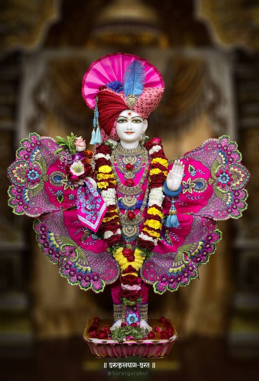 Swaminarayan with floral decorations and blessings