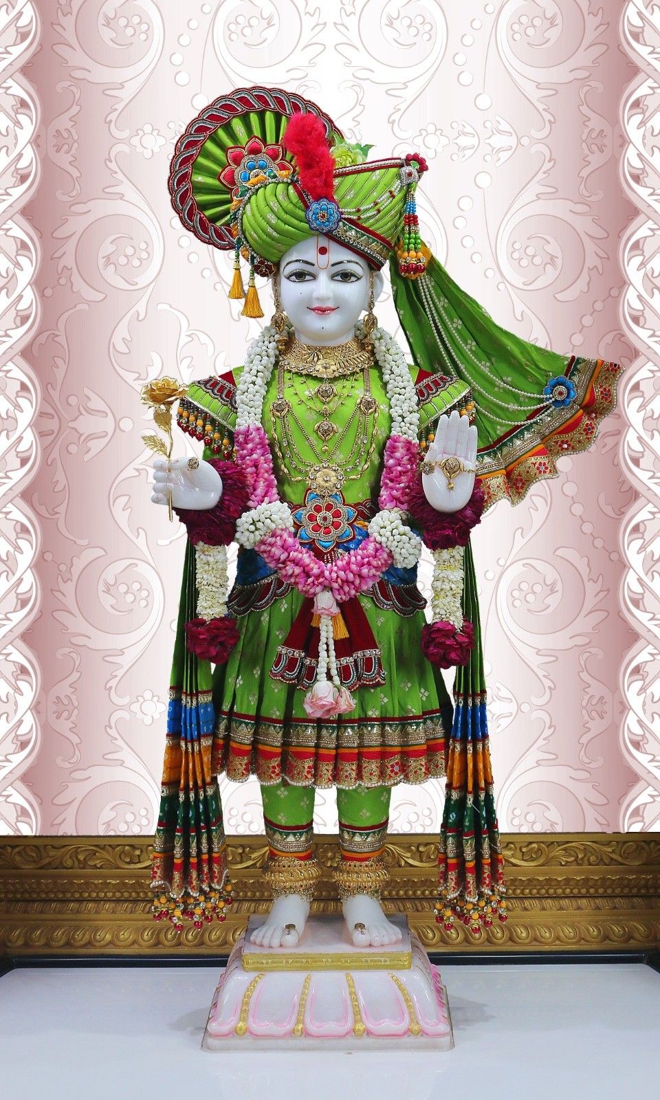 Swaminarayan Bhagwan in green attire