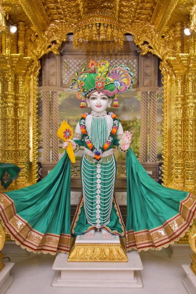 Swaminarayan Bhagwan in ornate temple setting