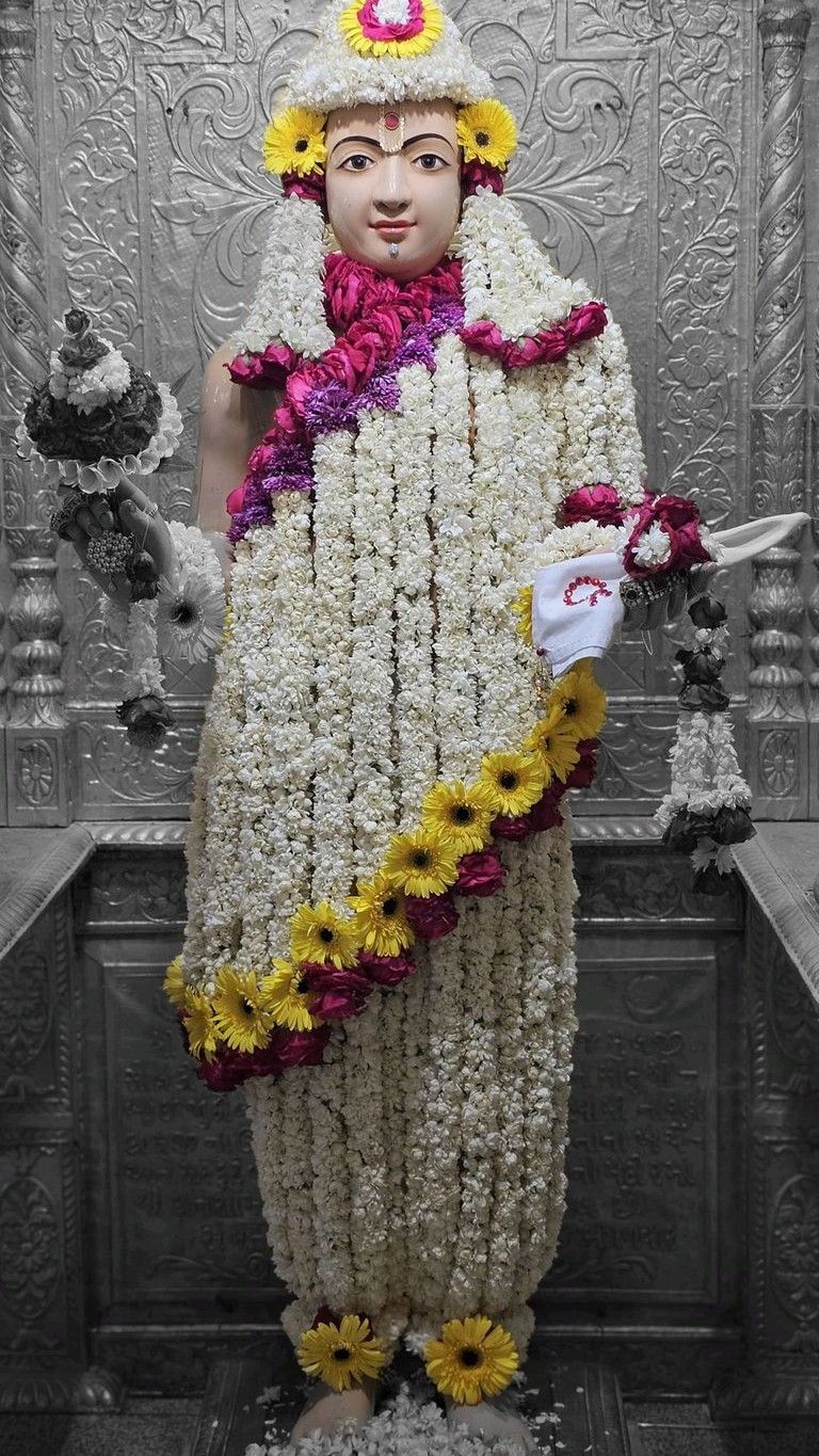 Swaminarayan adorned with floral garlands