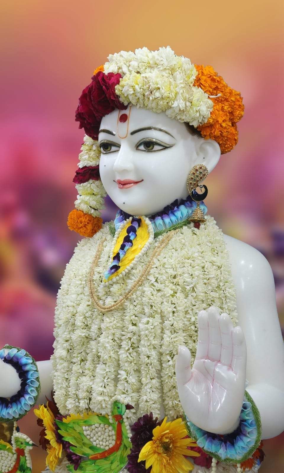 Swaminarayan with floral garland
