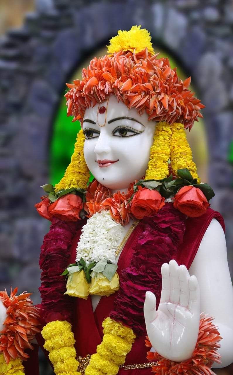 Swaminarayan Bhagwan with floral garlands