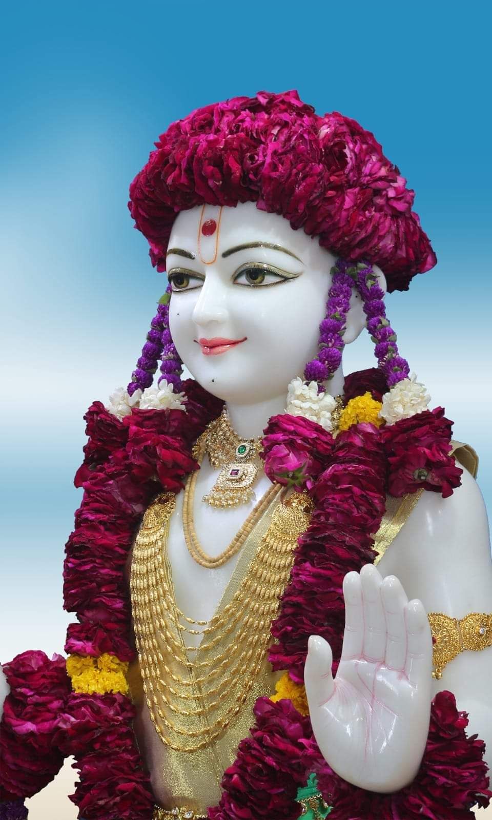 Swaminarayan Bhagwan with flower garland