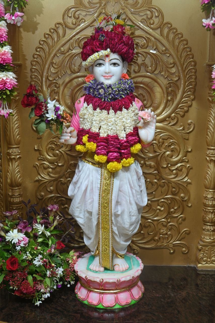 Swaminarayan Bhagwan with flower garlands