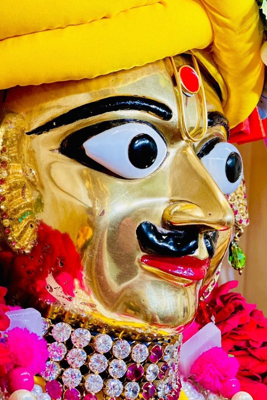 Swaminarayan golden face close-up