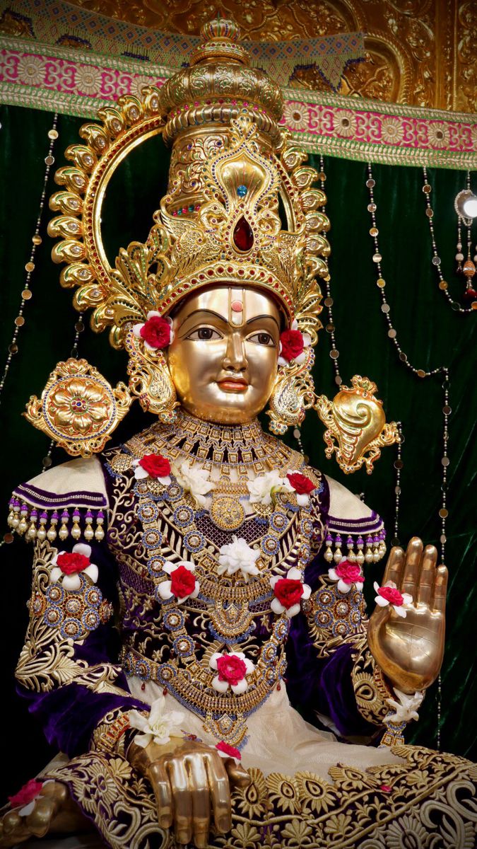 Golden Swaminarayan with blessing hand