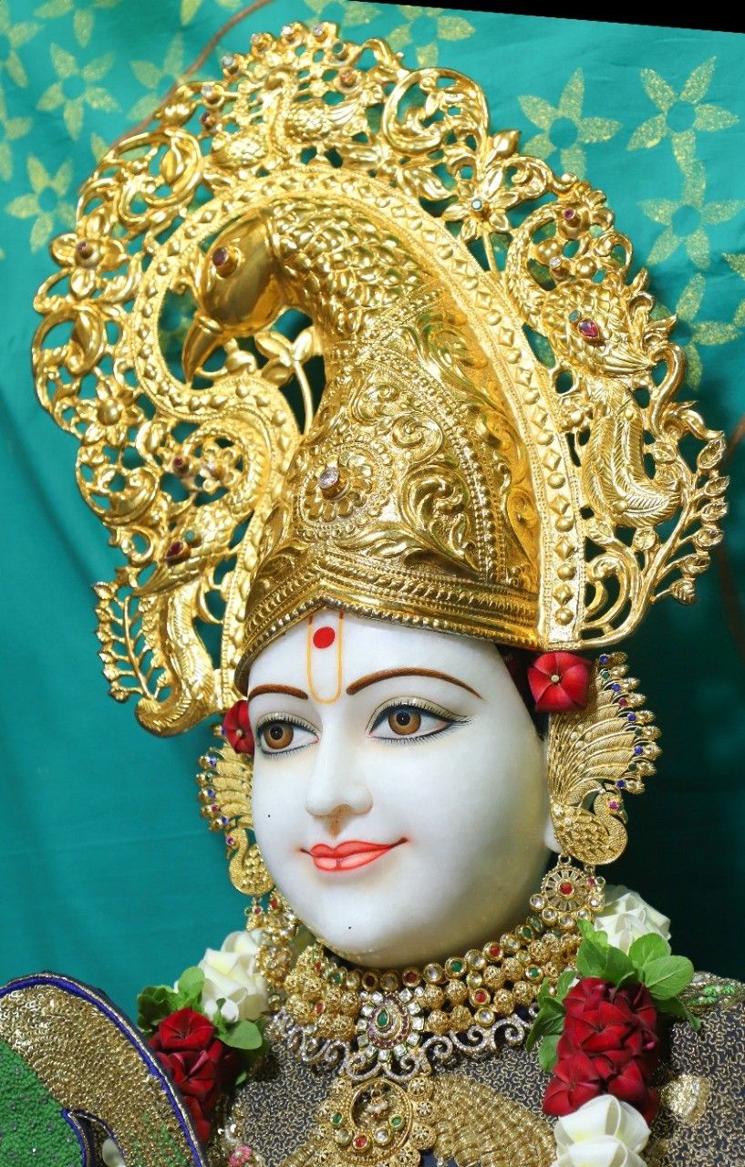 Swaminarayan with ornate golden crown