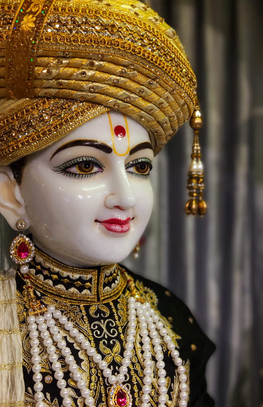 Close-up of Shree Swaminarayan’s serene face