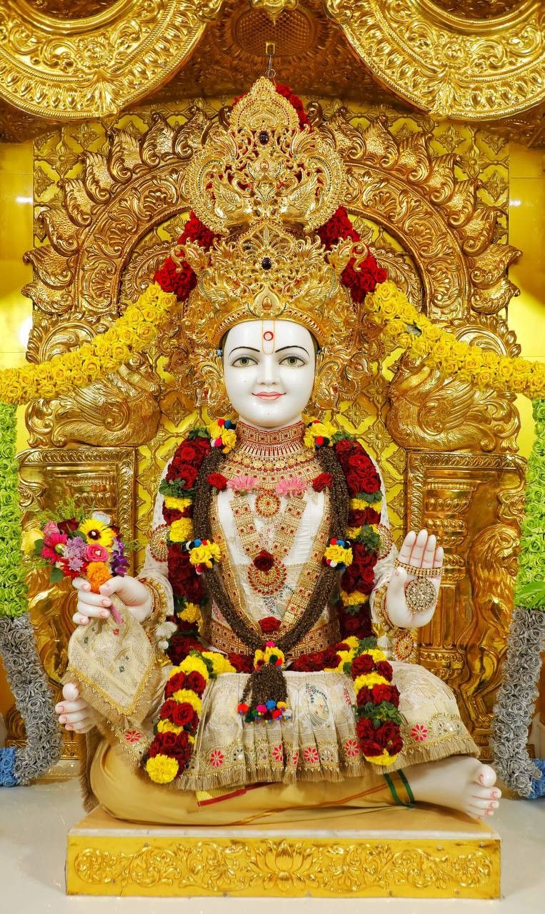 Swaminarayan seated on a golden throne