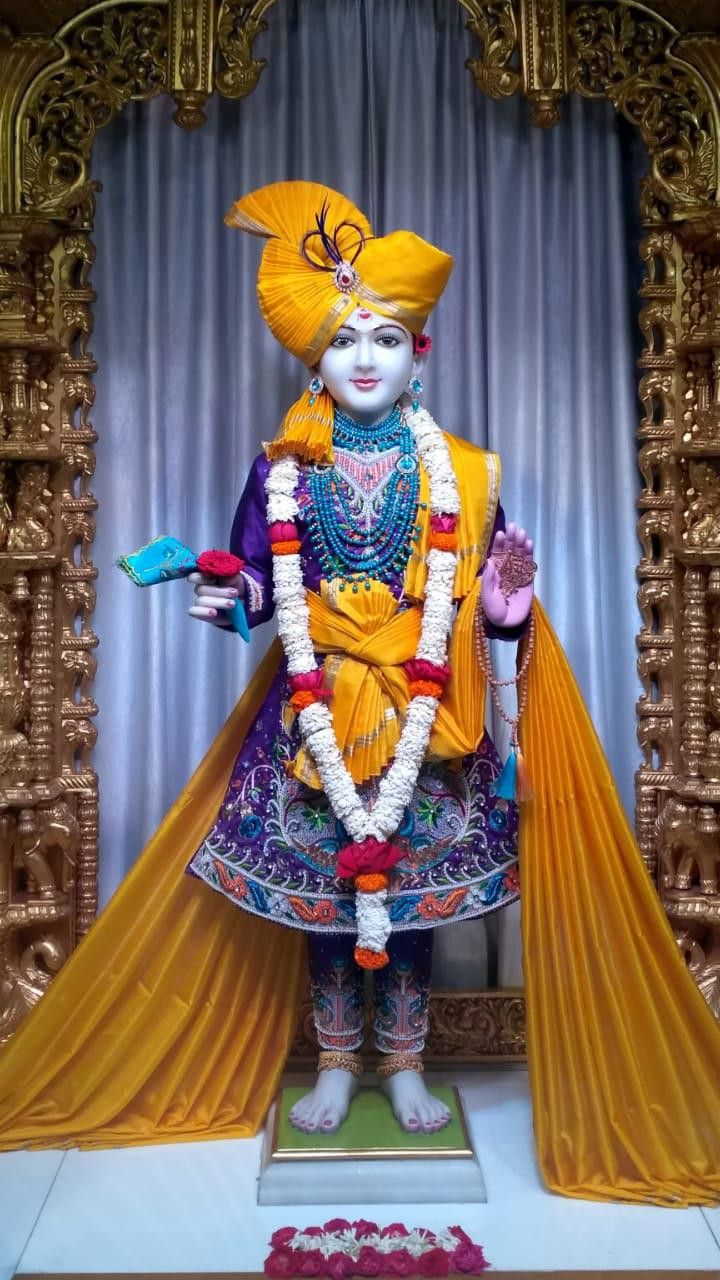 Swaminarayan deity in golden attire