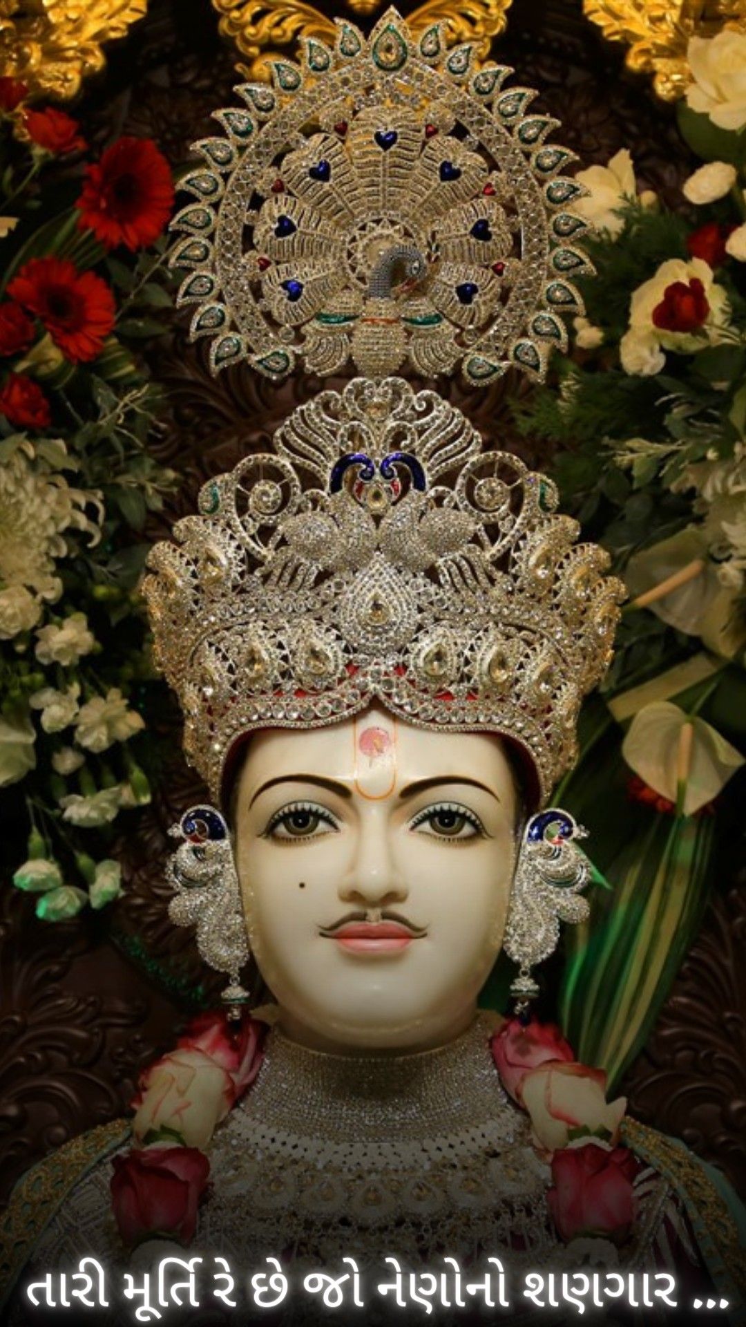 Swaminarayan with ornate jeweled crown