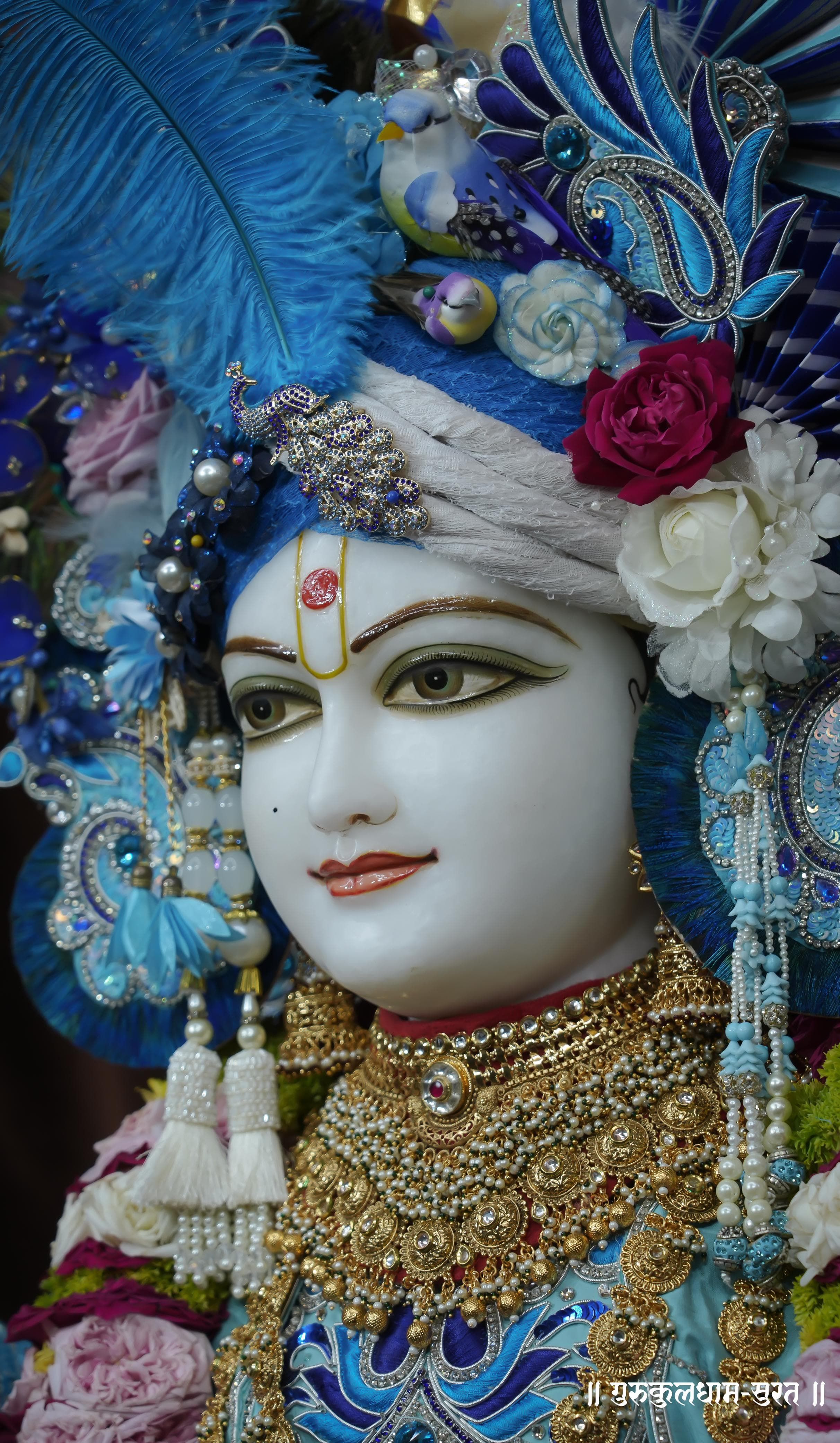 Swaminarayan Bhagwan with floral crown