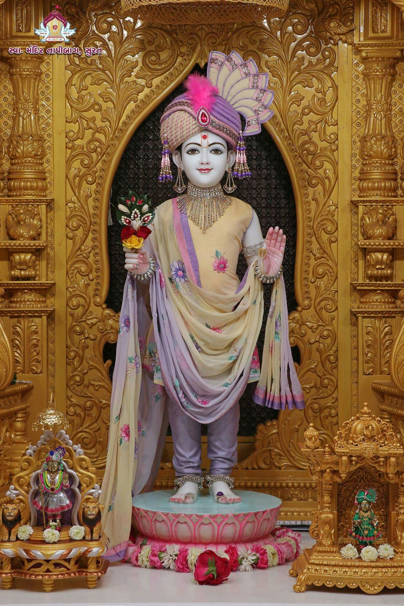 Swaminarayan deity in ornate temple setting